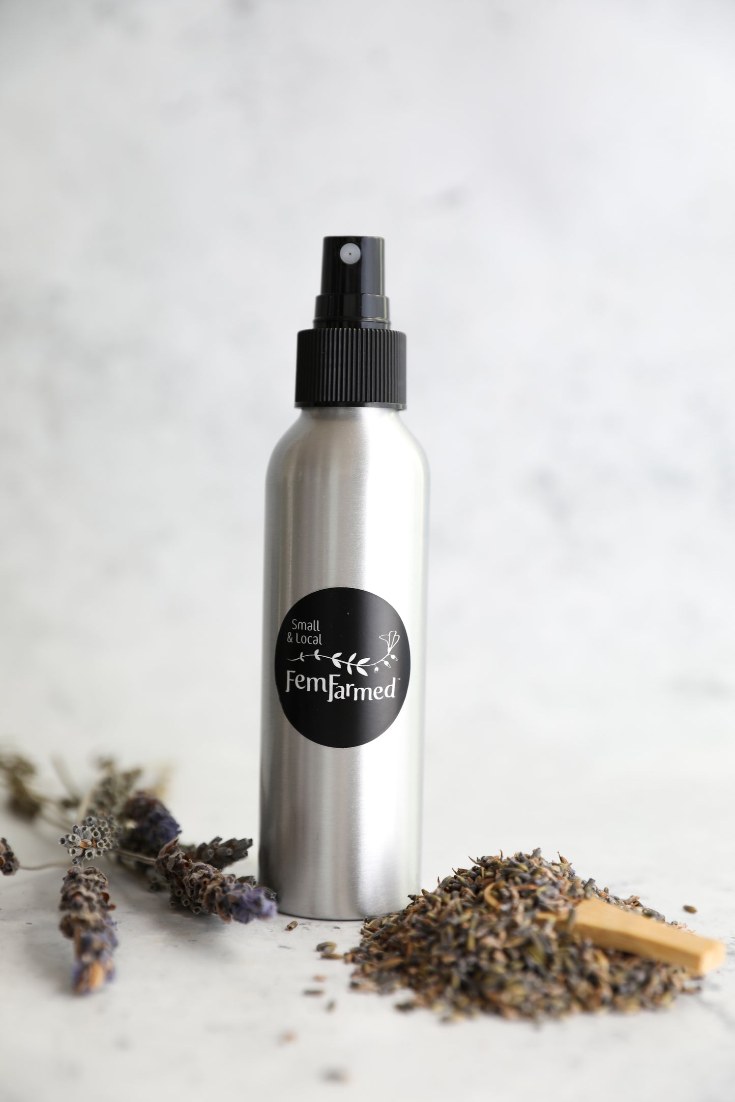 FemFarmed hydrosol metal spray bottle with lavender flowers